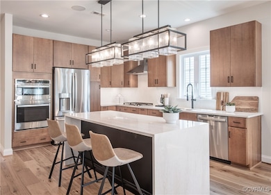 Kitchen featuring sink, appliances with stainless