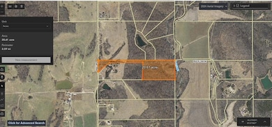 Aerial map of property and surrounding area featuring property parcel outlined