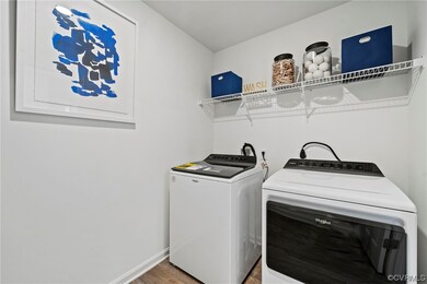 Clothes washing area with washer and clothes dryer