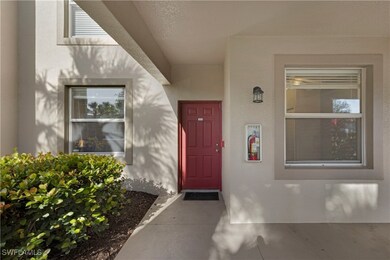 View of exterior entry with covered entry