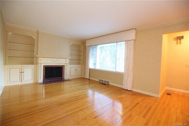Beautiful hardwood floor, wood burning fireplace &