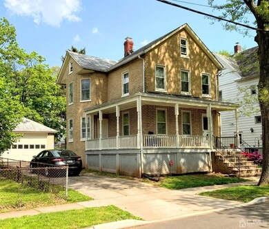 Brick exterior long driveway and a large detached 
