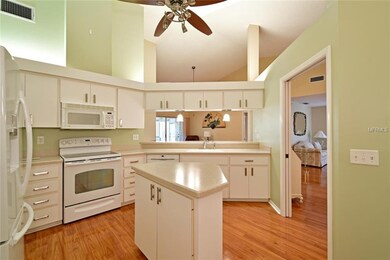 Samsung refrigerator and Corian on Island and coun