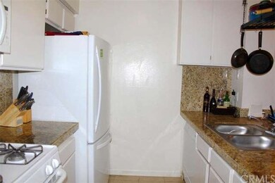 Kitchen with Granite Counters and Stainless Steel 