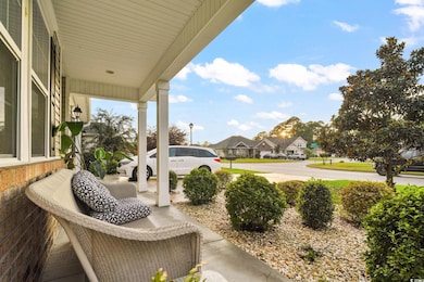 Covered porch with a residential view
