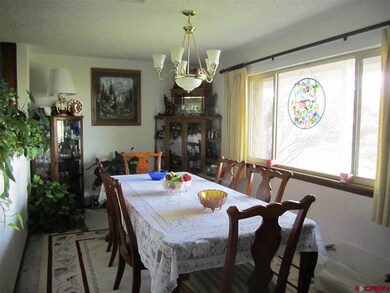 large picture window faces west mountains