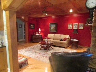Spacious Living Room Check out the Wood Panel Ceiling