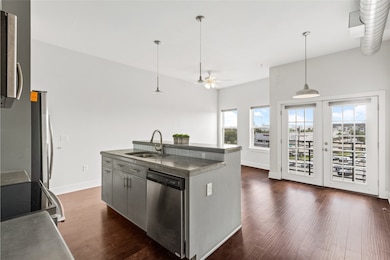 Wall of windows and French doors infuse the home w