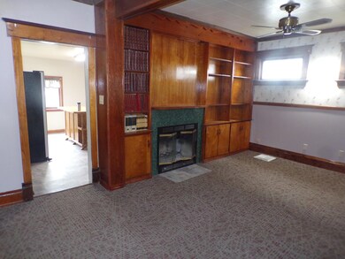 4-Grand livin-dining room with wood fire