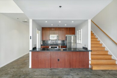 Kitchen with appliances with stainless steel finis
