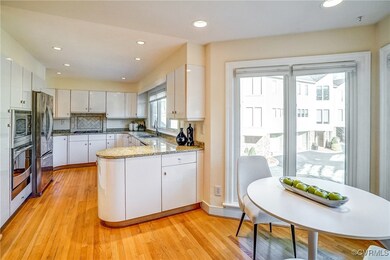 Kitchen featuring stainless steel appliances, hard