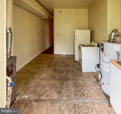 319 E 22nd St, Baltimore, MD 21218 - photo 4