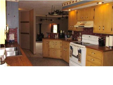 Continue through the dining room into the kitchen.