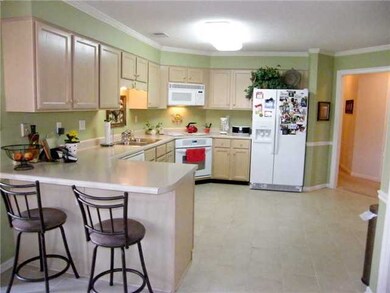 Good size open kitchen -- lots of cabinets and amp