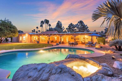 Back yard pool/waterfall and patio
