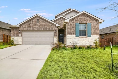 Single story home featuring stone siding, a front