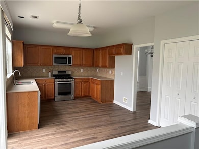 Kitchen with appliances with stainless steel finis