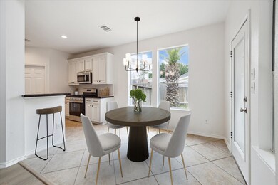 Start your mornings in this bright and cheery breakfast nook. Perfectly suited for a small four top. (Photo has been virtually staged)