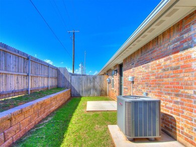 Fenced backyard featuring a patio