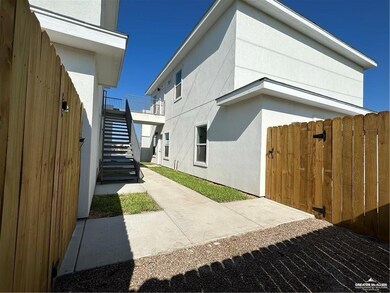 View of side of home with a patio area