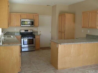 Lots of cubbard space in this kitchen with a built
