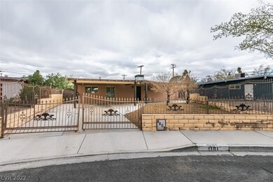 Front yard with carport and 2 large patio covers,