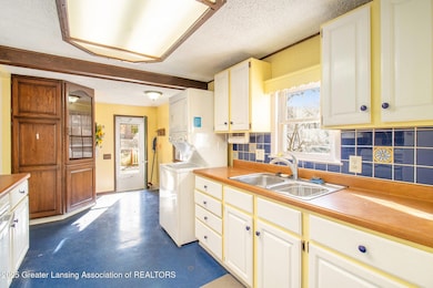 1119 W Miller Rd, Lansing, MI 48911 - photo 5