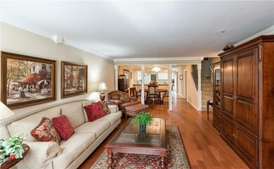 Open living room, dining room and kitchen area wit