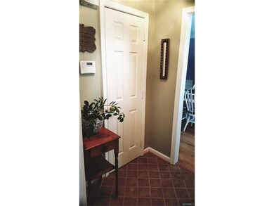 Entrance foyer with ceramic tile floor. Entrance t