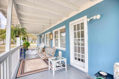 View of patio with covered porch