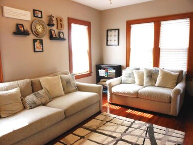 Beautifully refinished hardwoods in the living roo