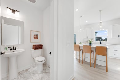 (Photo of a similar home, actual finishes may vary)