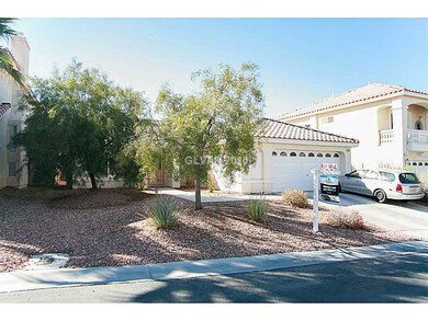 Facade/Exterior Front. 8027 Avalon Island St, Las
