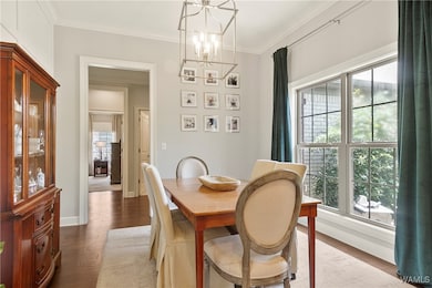 The formal dining area that leads into hall to acc