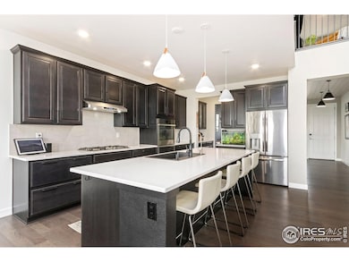 Stainless appliances and beautiful island in the kitchen