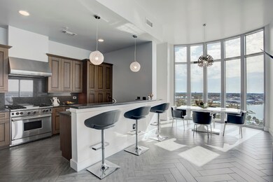 Dining Room with massive view of the lake and Bay