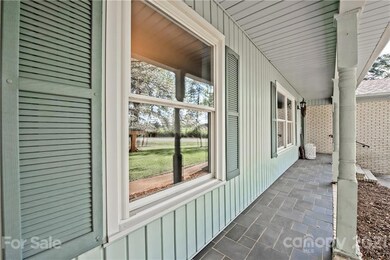Spacious, covered, Rocking Chair, front porch for complete relaxation!