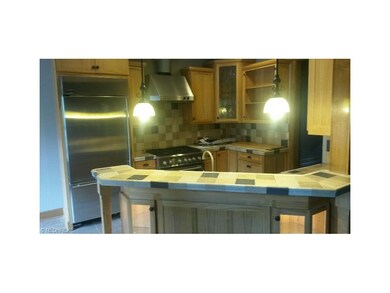 custom built kitchen with hand made cabinetry.