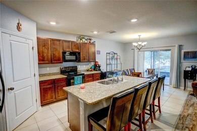 Huge Kitchen with breakfast bar/island & large wal