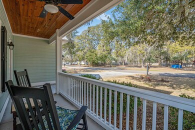 Balcony with ceiling fan and a porch