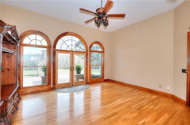 Spare room with baseboards, french doors, a ceilin