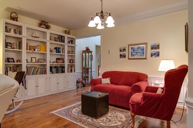 The dining room is currently set up as a sitting area.