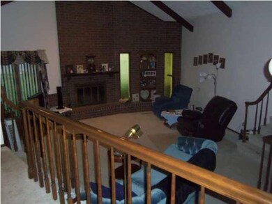 Looking into sunken living room from dining room