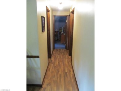 Hallway to the main bath and 3 bedrooms