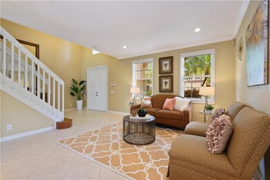 Lovely living room, crown molding, light and brigh