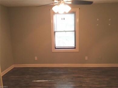 Living room with view of the back yard.