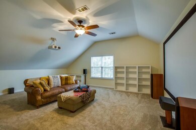 Separate bonus room over the garage set up as media room. All media equipment to remain with property. 