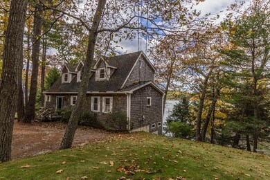 The main house with cottage in...