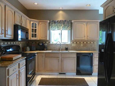 Kitchen. Ample cabinets w/ ceramic tile floors & b