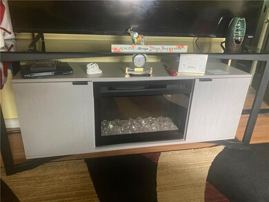 Electric fireplace to stay with the home